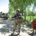German soldiers with an Afghan boy. 